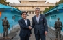 This handout photo taken on November 3, 2025 and provided by the South Korean Defence Ministry shows US Defense Secretary Pete Hegseth (R) shaking hands with South Korean Defence Minister Ahn Gyu-back (L) as they visit the truce village of Panmunjom in the Demilitarized Zone (DMZ) dividing the two Koreas. Photo by Handout / South Korean Defence Ministry / AFP