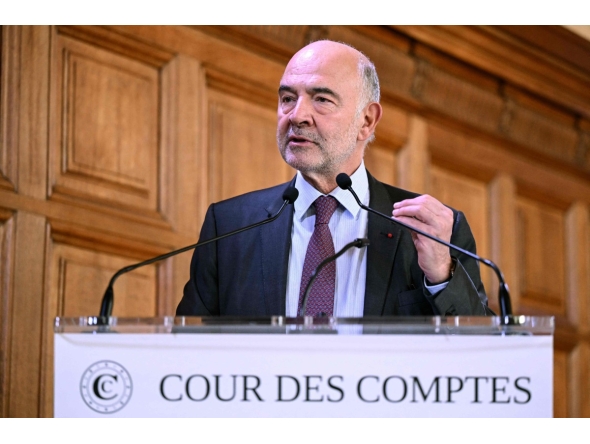 French Court of Accounts (Cour des comptes) first President Pierre Moscovici speaks during the presentation of the Court of Accounts' report on the Louvre, at the Court of Accounts in Paris on November 6, 2025. Photo by Bertrand GUAY / AFP