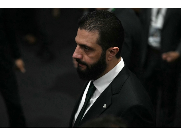 Syria's President Ahmad Al Sharaa at the COP30 UN Climate Change Conference in Belem, Para State, Brazil, on November 6, 2025. (Photo by Mauro PIimentel / AFP)
