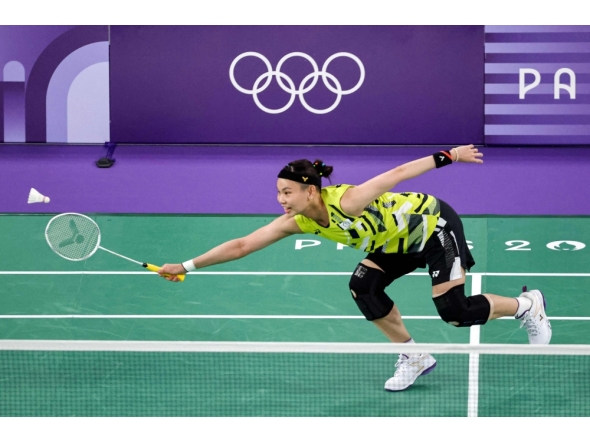(Files) Taiwan's Tai Tzu-ying plays a shot to Belgium's Lianne Tan in the women's singles badminton group stage match during the Paris 2024 Olympic Games in July 2024. (Photo by David Gray / AFP)