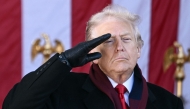 US President Donald Trump salutes at the conclusion of a Veterans Day ceremony at Arlington National Cemetery in Arlington, Virginia on November 11, 2025. (Photo by Brendan Smialowski / AFP)