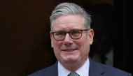 Britain's Prime Minister Keir Starmer leaves 10 Downing Street in central London on November 12, 2025, to take part in the weekly session of Prime Minister's Questions (PMQs). (Photo by Adrian Dennis / AFP)