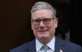 Britain's Prime Minister Keir Starmer leaves 10 Downing Street in central London on November 12, 2025, to take part in the weekly session of Prime Minister's Questions (PMQs). (Photo by Adrian Dennis / AFP)
