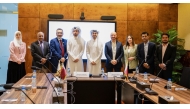 Executive Director of Motor Insurance at Qatar Islamic Insurance Group, Mohammed Al-Rasheed and Co-Founder of PayLater Mohammad Al Dulaimi with other officials during the signing ceremony.