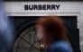 Pedestrians walk past the store of British fashion label Burberry in central London on September 2, 2024. Photo by HENRY NICHOLLS / AFP