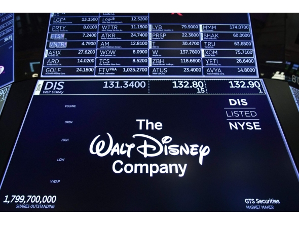 A logo for The Walt Disney Company is displayed on a trading post during the opening bell on the floor of the New York Stock Exchange (NYSE), in New York on May 14, 2019. Photo by Drew ANGERER / GETTY IMAGES NORTH AMERICA / AFP