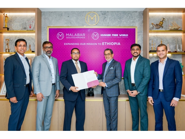 Vice Chairman of Malabar Group, Abdul Salam K.P, handing over the Letter of Intent to Consul General of Ethiopia in Dubai, H E Asmelash Bekele in the presence of other officials.