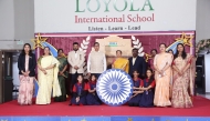 School principal and guests with the winning students and teachers.  
