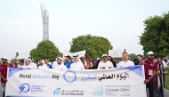 Representatives and participants walking around Aspire park to mark World Diabetes Day.
