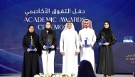 UDST President Dr. Salem Al-Naemi with some of the awardees during the ceremony.