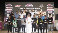 QRC Director Sheikh Jabor bin Khalid Al-Thani poses for a photo with the podium winners.