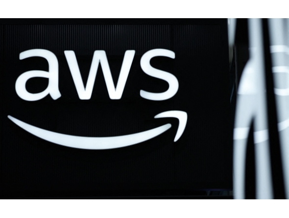 The logo of Amazon Web Services (AWS) is seen during the opening of the Hannover Messe industrial trade fair for mechanical and electrical engineering and digital industries, on March 31, 2025 in Hanover, northern Germany. Photo by RONNY HARTMANN / AFP