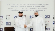 Secretary General of QRDI Council Eng Omar Ali Al Ansari and CEO of Qatari Diar Eng Ali Mohamed Al-Ali at the MoU signing ceremony. 
