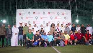 Officials and players at the Peace Tournament.