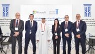 UDST President Dr. Salem Al-Naemi with Microsoft Qatar and university officials.