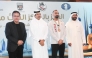Qatar Chess Federation President Mohammed Al Mudahka poses for picture with International Master Hussein Aziz, who won open blitz bronze. 