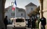 A Gendarmerie car drives past the entrance of the jail of Dijon, eastern France on November 27, 2025. (Photo by Arnaud Finistre / AFP)