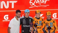 FROM LEFT: Serbian tennis player Novak Djokovic, Mercedes’ British driver George Russell, McLaren’s Oscar Piastri and  McLaren’s Lando Norris pose for a photo after the sprint race. PICS: AFP