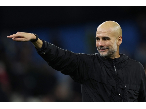 Manchester City's Spanish manager Pep Guardiola acknowledges the crowd at the end of the English Premier League football match between Manchester City and Liverpool at the Etihad Stadium in Manchester, north west England, on November 9, 2025. (Photo by Darren Staples / AFP)

