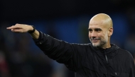 Manchester City's Spanish manager Pep Guardiola acknowledges the crowd at the end of the English Premier League football match between Manchester City and Liverpool at the Etihad Stadium in Manchester, north west England, on November 9, 2025. (Photo by Darren Staples / AFP)

