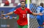 Morocco’s Karim El Berkaoui celebrates after scoring his team’s third goal. 