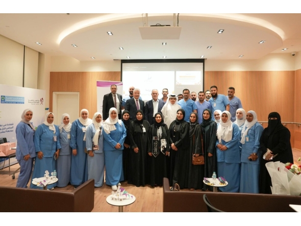 Officials with the participants at the workshop.