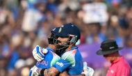 India's Virat Kohli (R) congratulates Ruturaj Gaikwad as he celebrates after scoring a century (100 runs) in Raipur on December 3, 2025. (Photo by Noah Seelam / AFP) 