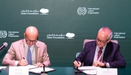 Country Office Director of the ILO Doha Francesco d’Ovidio and President of Higher Education and Education Advisor QF Francisco Marmolejo signing the agreement. 