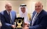 Secretary-general of the Arab League Ahmed Aboul Gheit (left) along with another official honouring Minister of State and President of Qatar National Library H E Dr. Hamad bin Abdulaziz Al-Kawari (centre) during the forum.
