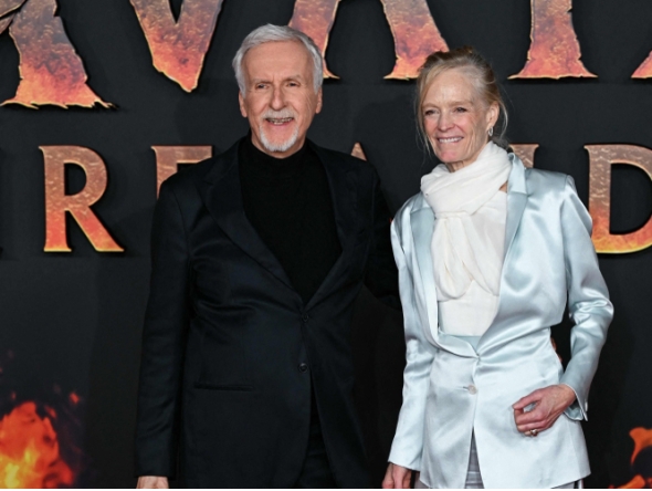 US director James Cameron and his spouse US former actress and model Suzy Amis Cameron pose during a photocall for the European premiere of 