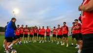 Iraq players assemble ahead of their training session. 