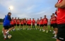 Iraq players assemble ahead of their training session. 