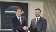 Adviser to QCS, Mustafa Erogut and  Member of the Board of Directors of Acibadem Group Dr. Mohannad Adnan signing the agreement. 