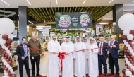 Assistant Undersecretary for Consumer Affairs at the Ministry of Commerce and Industry Hassan bin Sultan Al-Ghanim and Chief Executive Officer of Al Meera Jassim Mohammed Al Ansari opening  Local Farmers Market Festival.