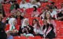 Fans cheer during the FIFA Arab Cup semi-final between Jordan and Saudi Arabia at Al Bayt Stadium on Monday.