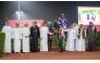 The connections of Naseeb Zakhir celebrate after the Osama Omer Al-Dafea-owned grey colt won the Zekreet Cup. PICTURES: JUHAIM/QREC