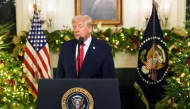 US President Donald Trump addresses the nation from the Diplomatic Reception Room of the White House in Washington, DC, on December 17, 2025. Photo by Doug MILLS / POOL / AFP