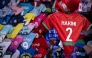 Morocco defender Achraf Hakimi's jersey is displayed in a shop in Rabat, on December 19, 2025, ahead of the Africa Cup of Nations (AFCON). (Photo by Sebastien Bozon / AFP)