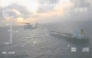 This screen grab taken from a video posted on the X account of US Secretary of Homeland Security Kristi Noem shows a US Coast Guard aircraft flying over a crude oil tanker, last docked in Venezuela, before apprehending it on December 20, 2025. (Photo by Handout / US Secretary of Homeland Security Kristi Noem's X account / AFP) 