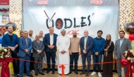 Officials and guests during the opening of Oodles Wok outlet at City Centre Doha Mall.