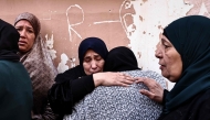 Women grieve during the funeral of Ahmad Zyoud in the village of Silat al-Harithiya, close to the northern West Bank city of Jenin on December 21, 2025. (Photo by Zain JAAFAR / AFP)
