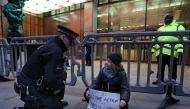 A handout photograph taken on and released by Prisoners for Palestine in London on December 23, 2025 shows Swedish activist Greta Thunberg before her arrest at Plantation Place on Fenchurch Street. (Photo by Prisoners for Palestine / AFP) 