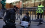 A handout photograph taken on and released by Prisoners for Palestine in London on December 23, 2025 shows Swedish activist Greta Thunberg before her arrest at Plantation Place on Fenchurch Street. (Photo by Prisoners for Palestine / AFP) 