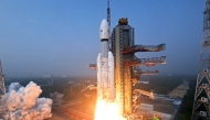 This handout photograph taken and released on December 24, 2025 by the Indian Space Research Organisation (ISRO) shows ISRO's launch vehicle LVM3-M6 carrying the United States’ next-generation BlueBird Block-2 communication satellite of AST SpaceMobile lifting off from the launch pad at the Satish Dhawan Space Centre in Sriharikota in India's Andhra Pradesh state. (Photo by Indian Space Research Organisation (ISRO) / AFP) 