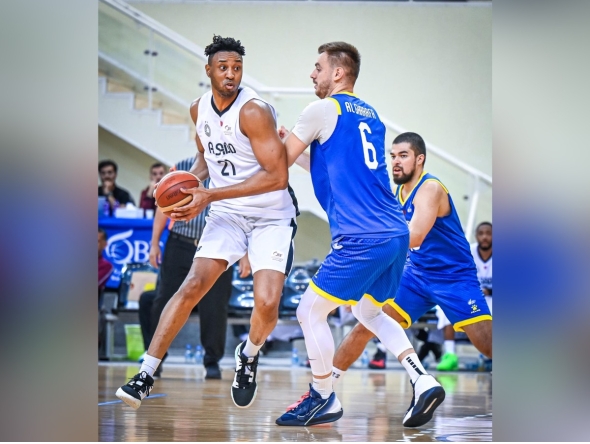 Al Sadd's Malik Antonyo Toppin (left) in action during the match against Al Gharafa. 