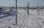 SNCF railway tracks are covered in snow in La Rochelle, western France, on January 6, 2026. (Photo by Amelia BLANCHOT / AFP)