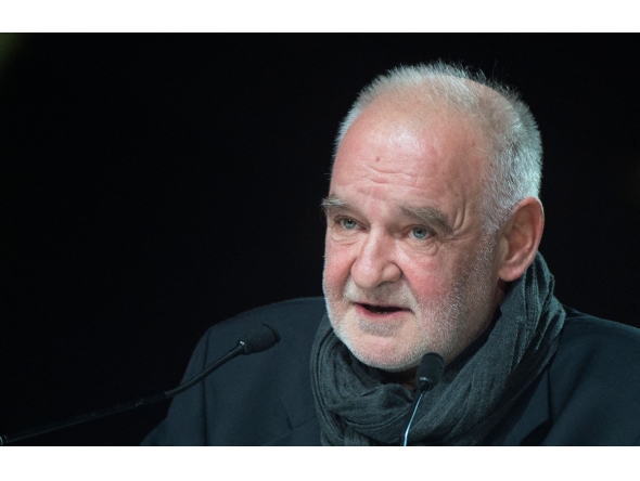(FILES) Hungarian film director Bela Tarr speaks during the opening ceremony of the 16th edition of the Marrakech International Film Festival on December 2, 2016, in Marrakesh, Morocco. (Photo by FADEL SENNA / AFP)