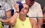 Aryna Sabalenka of Belarus places an ice pack on her head during her women's singles match against Sorana Cirstea of Romania at the Brisbane International tennis tournament in Brisbane on January 8, 2026. (Photo by William WEST / AFP)