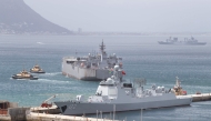 A general view of Chinese and Iranian navy ships docked at Simon's Town Harbour near Cape Town, on January 8, 2026 (Photo by RODGER BOSCH / AFP)