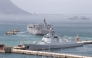 A general view of Chinese and Iranian navy ships docked at Simon's Town Harbour near Cape Town, on January 8, 2026 (Photo by RODGER BOSCH / AFP)